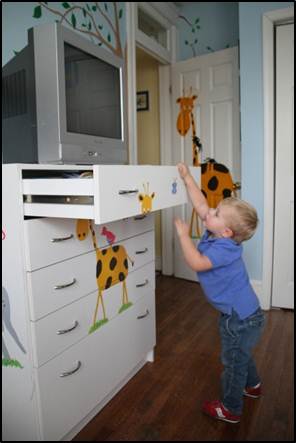 photo of dresser with TV